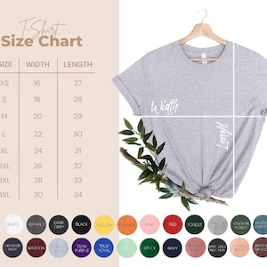 Puede incluir: Tabla de tallas de camiseta con medidas en pulgadas para el ancho y la longitud. La tabla muestra las tallas XS a 4XL. Se muestra una camiseta gris colgada de una percha. La tabla tambi&eacute;n muestra una paleta de colores de 24 colores diferentes.