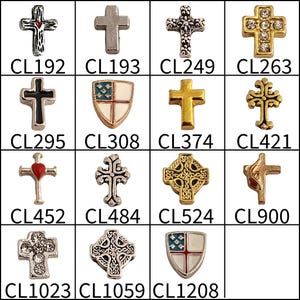 May include: A grid of fourteen small metal charms featuring various cross and shield designs, each labeled with a unique alphanumeric code from CL192 to CL1208. The charms include gold, silver, and enamel finishes with some featuring clear rhinestones.