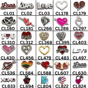 May include: A collection of heart-shaped charms and charms with the word "Love" in various styles. Some charms feature gemstones, while others have unique designs like arrows, rainbows, and the American flag. The charms are labeled with codes.