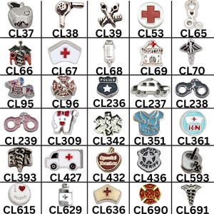 May include: A collection of small metal charms featuring various symbols including medical icons, emergency vehicles, badges, and tools. Each charm is labeled with a unique code such as CL37 through CL691, arranged in a grid format on a white background.