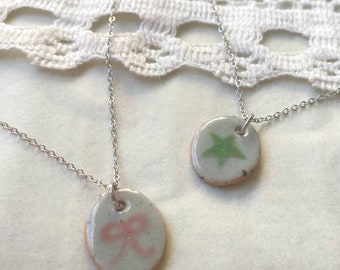 handmade ceramic pendant necklace ~  bow necklace star necklace