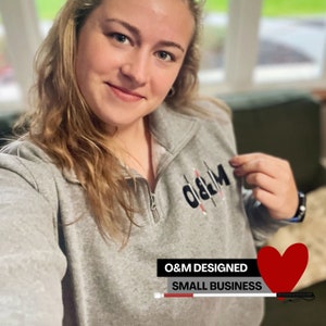 Model in fleece. O&M designed small business. Review: “I bought my daughter a guide dog sweatshirt and she ABSOLUTELY loves it!”
