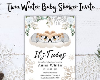 May include: A baby shower invitation with a winter theme. The invitation features two penguins wearing hats and a snowflake design. The text on the invitation reads "It's Twins" and "Anna White".