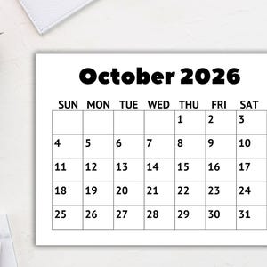 Printable large print calendar on desk for home office planning, clean and minimal calendar design