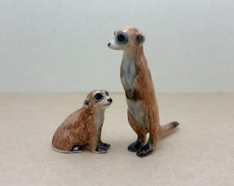 The Watchful Pair: Hand-Painted Ceramic Meerkat Miniatures