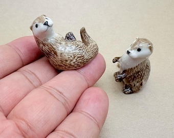 Playful Otter Ceramic Figurine – Miniature Wild Animal Collectible