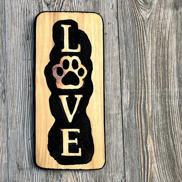 Dog pawe LOVE sign, Free hand carved on Northern White Cedar wood, black background, dark wood trim, pet lover gift, outset lettering bold