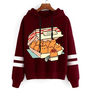 Comfortable hoodie with kitten nuggets graphic and sleeve stripes