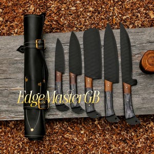 May include: A set of six black chef knives with wooden handles and a black leather knife roll. The blades have a textured finish. The knife roll is closed with a buckle. The text "EdgeMaster GB" is visible.