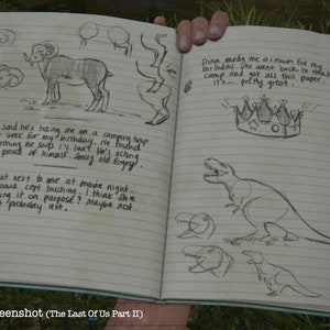May include: A notebook page with handwritten notes and drawings. The notes mention a camping trip, a birthday, and a movie night. The drawings include a ram, a crown, and a dinosaur.