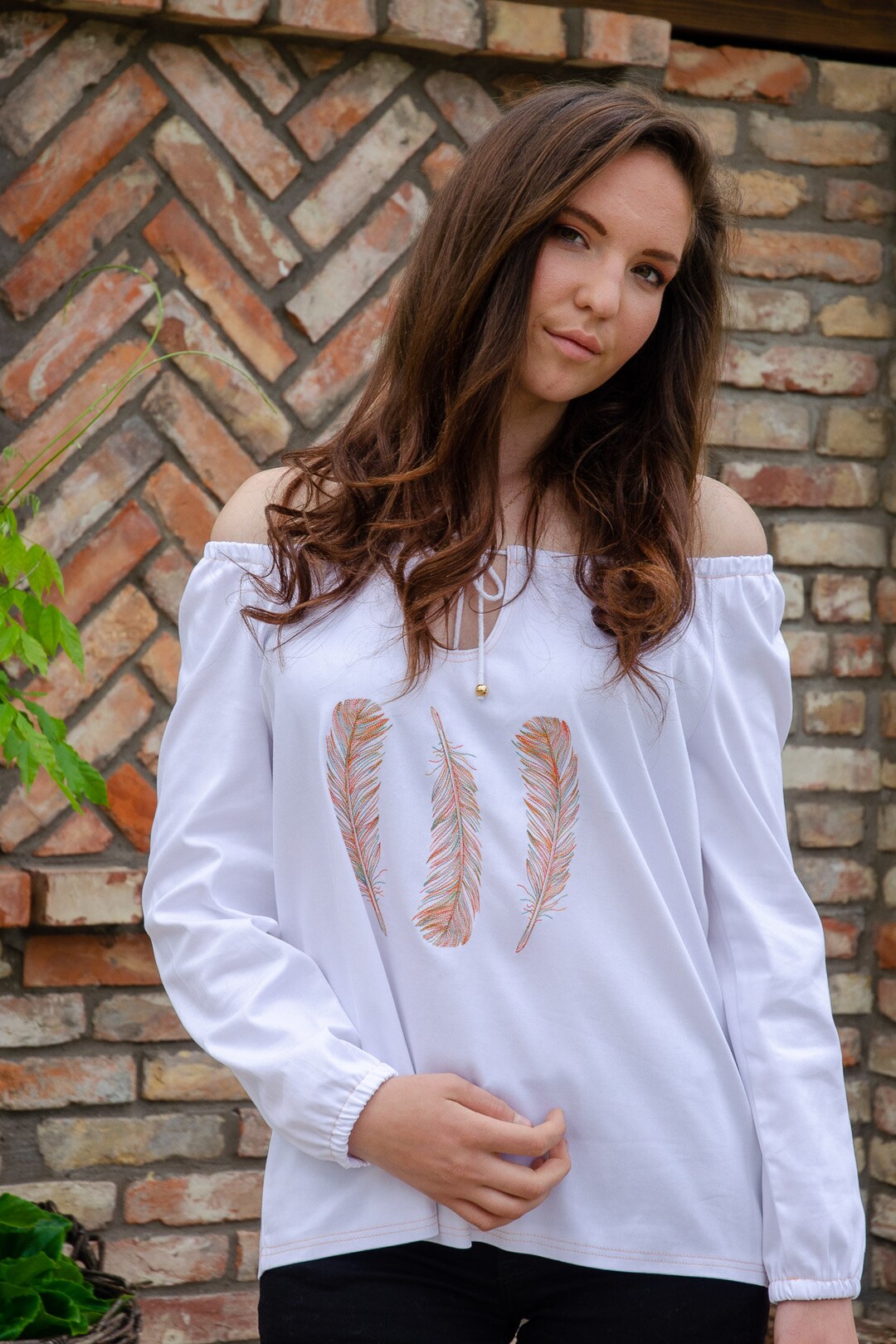 Tunica bianca ricamata con piume Italia