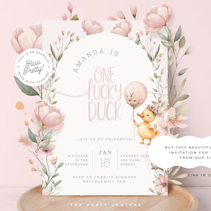 May include: A pink and green floral invitation for a first birthday party. The invitation says "Amanda is One Lucky Duck" and includes the date "Jan 16".