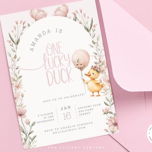 May include: A white invitation with pink floral illustrations and a cartoon duck holding a balloon. The text reads "Amanda is one lucky duck" and includes details for a birthday party.