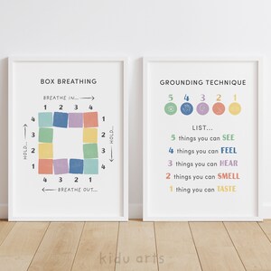 May include: Two printable posters with white frames, one titled "Box Breathing" with a colorful square diagram and instructions for breathing exercises, and the other titled "Grounding Technique" with a list of five senses and instructions for grounding.