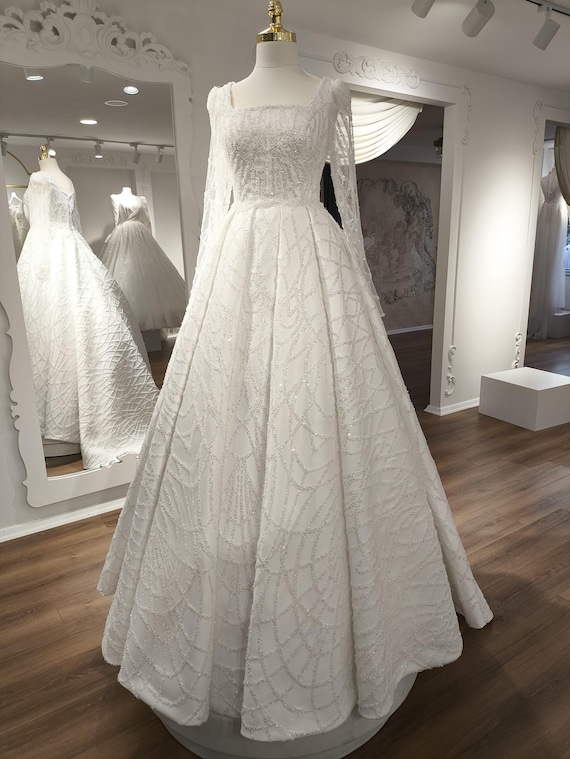 hand beaded wedding dress Hand Beaded Lace Wedding Dress: A-line Ivory Bridal Gown