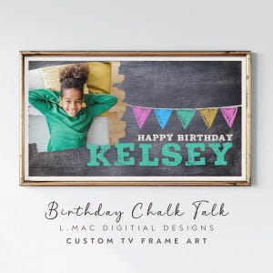 May include: A framed digital art print with a chalkboard background. The print features a photo of a person wearing a green shirt, the text "Happy Birthday Kelsey", and a colorful banner. The frame is gold.