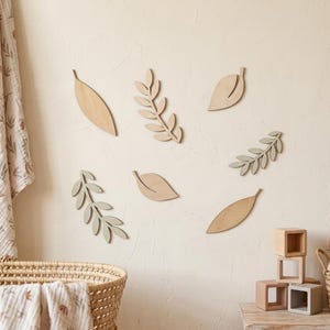 Ensemble de 7 stickers muraux en bois en forme de feuilles, décoration de chambre d'enfant sur le thème de la forêt, art mural botanique en bois, décoration bohème pour chambre de bébé, art mural neutre