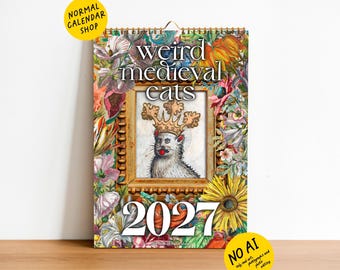 Puede incluir: Un calendario de pared 2027 titulado Weird Medieval Cats que presenta una ilustración central de un gato con corona dentro de un marco dorado, rodeado por un borde floral colorido. El texto Normal Calendar Shop y No AI es visible.