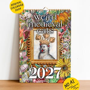 May include: A 2027 wall calendar titled Weird Medieval Cats featuring a central illustration of a cat wearing a crown inside a gold frame, surrounded by a colorful floral border. The text Normal Calendar Shop and No AI are visible.