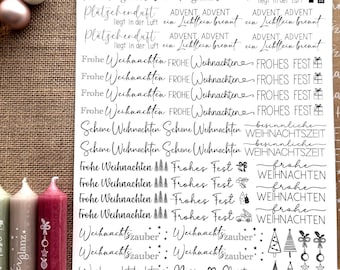 Könnte beinhalten: Ein weißes Blatt Papier mit schwarzem Text und Illustrationen. Der Text enthält Weihnachtsgrüße auf Deutsch und Englisch, wie "Frohe Weihnachten" und "Merry Christmas". Die Illustrationen beinhalten Sterne, Weihnachtsbäume und andere festliche Symbole.