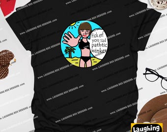 May include: Black t-shirt with a humorous graphic. The graphic features a cartoon woman on a beach with the text "Fick erf you sad pathic winker". The design is in a circular frame with a sun and palm tree.