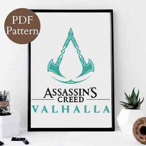 May include: Framed cross-stitch pattern featuring the Assassin's Creed Valhalla logo in teal and black. The words "ASSASSIN'S CREED VALHALLA" are displayed below the logo. A "PDF Pattern" label is in the upper left corner.