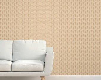 May include: A beige wallpaper with a repeating pattern of small, stylized teardrop shapes in a darker beige color.