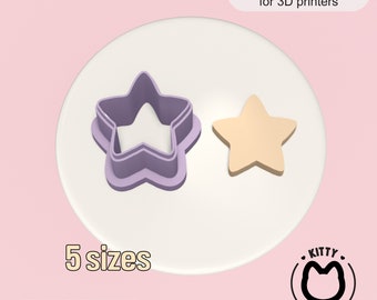 May include: A digital download of five different sized star cookie cutters. The cutters are purple and are shown on a white surface. The image also includes the text "INSTANT DOWNLOAD for 3D printers", "5 sizes", "DIGITAL FILE", and "STL File", and a logo that says "KITTY CUTTERS".
