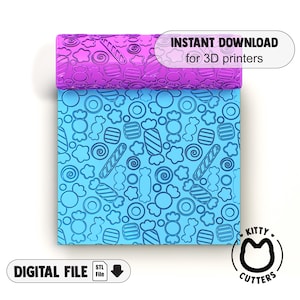 May include: A digital file for 3D printing a candy-themed rolling pin. The design features a blue background with a repeating pattern of candy, lollipops, and swirls. The text "INSTANT DOWNLOAD for 3D printers" and "KITTY CUTTERS" is visible in the image.