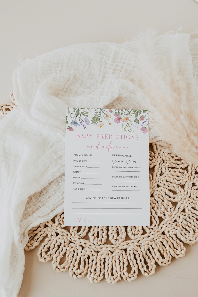 K&ouml;nnte beinhalten: Eine druckbare Babyparty-Spielkarte mit floralem Design. Die Karte hat Abschnitte f&uuml;r die G&auml;ste, um das Geburtsdatum, die Uhrzeit, das Gewicht, die L&auml;nge, die Augenfarbe, die Haarfarbe und die &Auml;hnlichkeit des Babys mit den Eltern zu erraten.