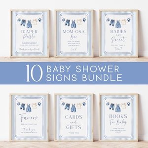 May include: A bundle of six framed baby shower signs with a blue and white striped background. Each sign features a clothesline with baby clothes illustrations and text such as "Diaper Raffle" and "Mom-osa Bar". The text "10 Baby Shower Signs Bundle" is also present.