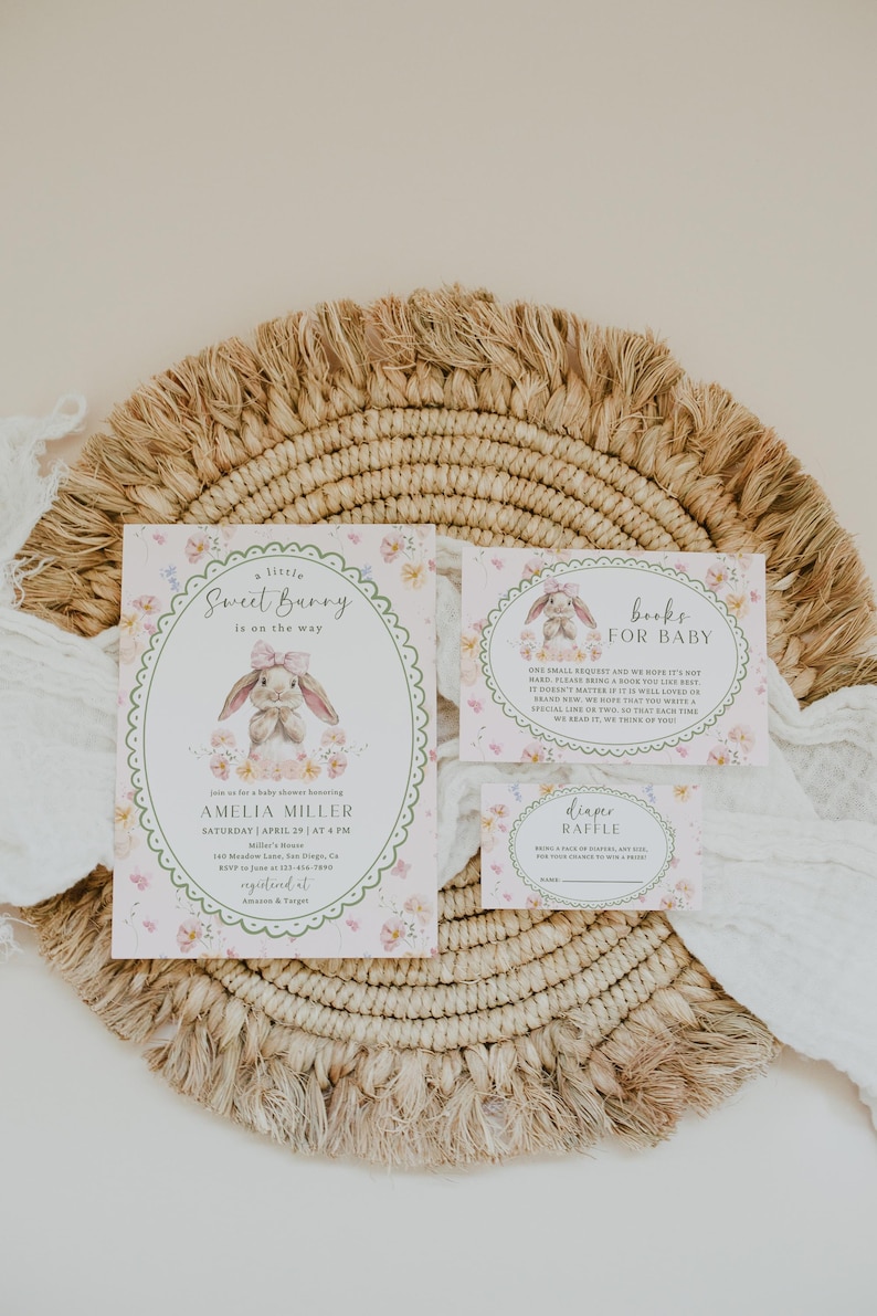 May include: Baby shower invitation set with a bunny theme. The invitation, book request, and diaper raffle cards feature floral accents and the text "Sweet Bunny." The invitation includes the name Amelia Miller and event details.
