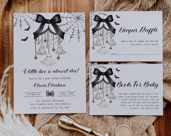 May include: Baby shower invitation set with a Halloween theme. The invitation, diaper raffle, and book request cards feature a black bow, spiderwebs, bats, and hanging ghosts. A gold wax stamp and seal are also present.