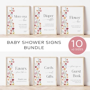 May include: Ten printable baby shower signs with floral designs. The signs include "Mom-osa Bar", "Diaper Raffle", "Flower Bar", "Favors", "Cards and Gifts", and "Guest Book".