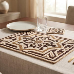 May include: A rectangular placemat and a square coaster featuring a geometric star pattern in shades of dark brown, tan, and cream. The items are crafted with intricate beadwork, creating a textured surface with a repeating star motif.