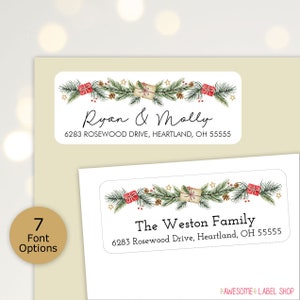 May include: Two Christmas address labels with a green garland design featuring red and white gift boxes, pine cones, and gold stars. The first label reads "Ryan & Molly" with the address "6283 Rosewood Drive, Heartland, OH 55555". The second label reads "The Weston Family" with the address "6283 Rosewood Drive, Heartland, OH 55555".
