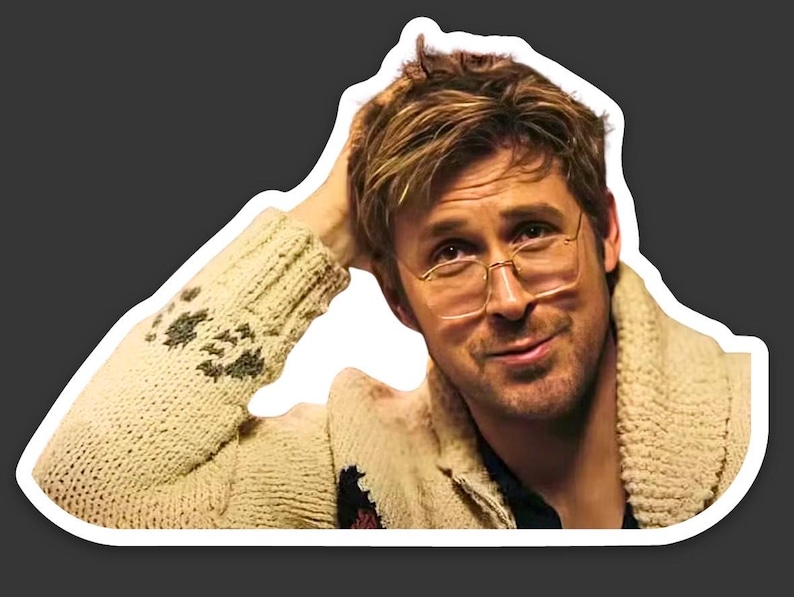 May include: A sticker featuring a person wearing gold-rimmed glasses and a cream-colored cable-knit sweater with dark brown accents. The person is smiling and has their hand on their head.