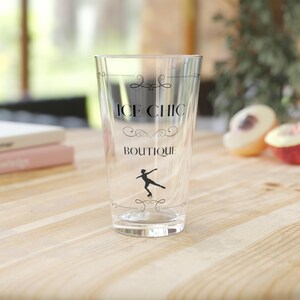 Ice Chic Boutique Pint Glass, 16oz. Signature Skater-Themed Glassware. Unique Gift for Figure Skating Enthusiasts.