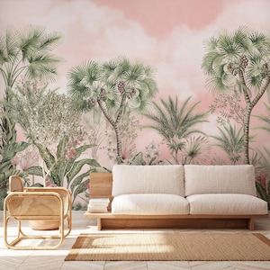 May include: A tropical-themed interior design featuring a pink sky mural with palm trees and lush greenery. A light-colored sofa, a woven chair, and a jute rug complete the scene, creating a serene and inviting atmosphere.