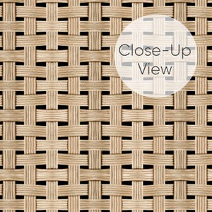 Close-up of tan woven cane wallpaper, textured grasscloth look.