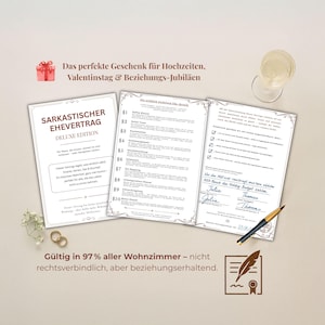 Könnte beinhalten: Ein humorvolles Hochzeitsgeschenk-Set mit einem sarkastischen Ehevertrag in deutscher Sprache. Das Set enthält einen Vertrag, einen Stift und ein Glas Champagner. Eheringe und eine Geschenkbox sind ebenfalls sichtbar.