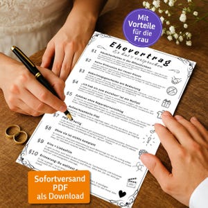 May include: A black pen poised over a white document with German text, including "Ehevertrag" and "Mit Vorteile für die Frau." Two gold wedding rings are on a wooden surface. An orange button reads "Sofortversand PDF als Download."