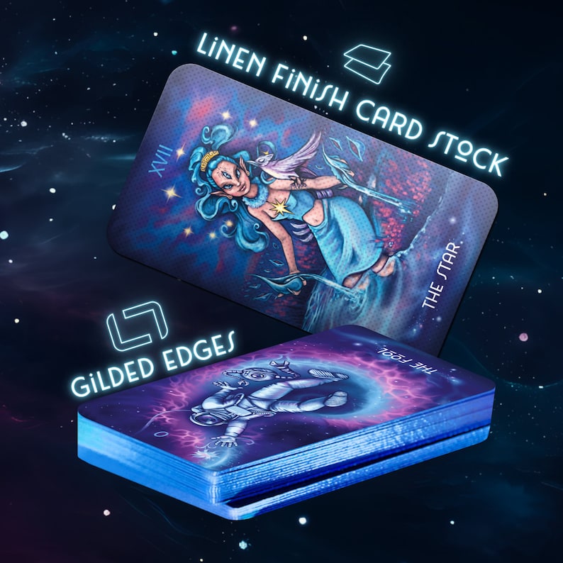May include: A deck of tarot cards with gilded edges and a linen finish. The cards feature colorful illustrations of a woman pouring water from a pitcher and an astronaut floating in space. The text on the cards reads "The Star" and "The Fool".