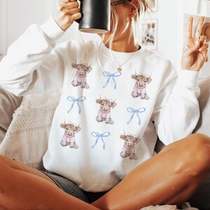 Highland Cow Sweatshirt Coquette Aesthetic Farm Shirt Gift for Cow Lover Blue Bows Cute Cow Sweatshirt Farming Sweatshirt Highland Cow Gift White Sweatshirt