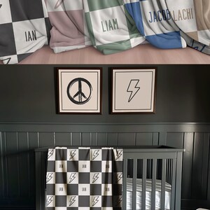 May include: Four personalized baby blankets with a checkered pattern and a lightning bolt design. The blankets are in different colors: black and white, pink and white, green and white, and blue and white. The names "Ian", "Liam", "Jacob Lachi", and "Malachi" are printed on the blankets.