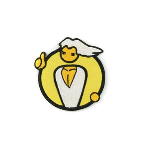 Puede incluir: Un parche bordado amarillo y blanco con un personaje de dibujos animados con cabello blanco, una camisa blanca y un fondo amarillo. El personaje está dando un pulgar hacia arriba.