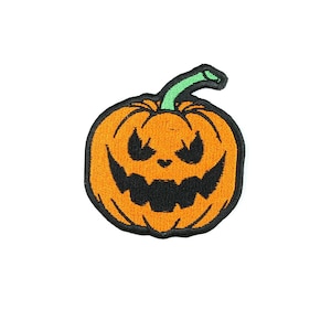 May include: Embroidered patch of a grinning jack-o'-lantern with a black face and a green stem. The pumpkin is orange with black stitching around the edges, ideal for Halloween-themed crafts and clothing.