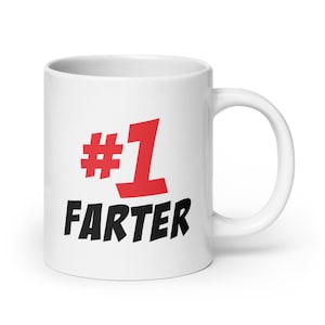 May include: White ceramic coffee mug with a red #1 and the word "FARTER" in black text.