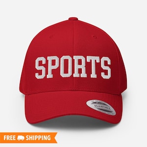 May include: Red baseball cap with white embroidered text that says "SPORTS".