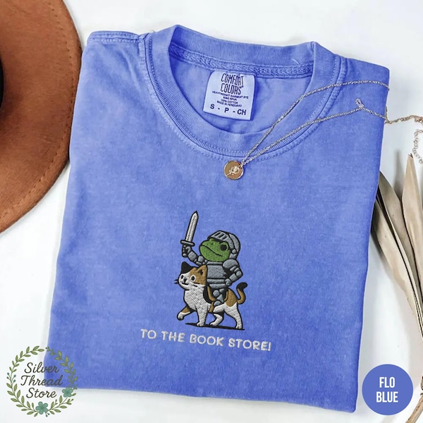 To The Book Store Frog Riding Cat Embroidered Shirt, Comfort Colors® Shirt, Medieval Frog Cat Shirt, Renaissance Fair Side Quest Shirt